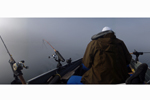 fisherman in fog photo